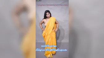 Sexy model strip yellow saree showing big